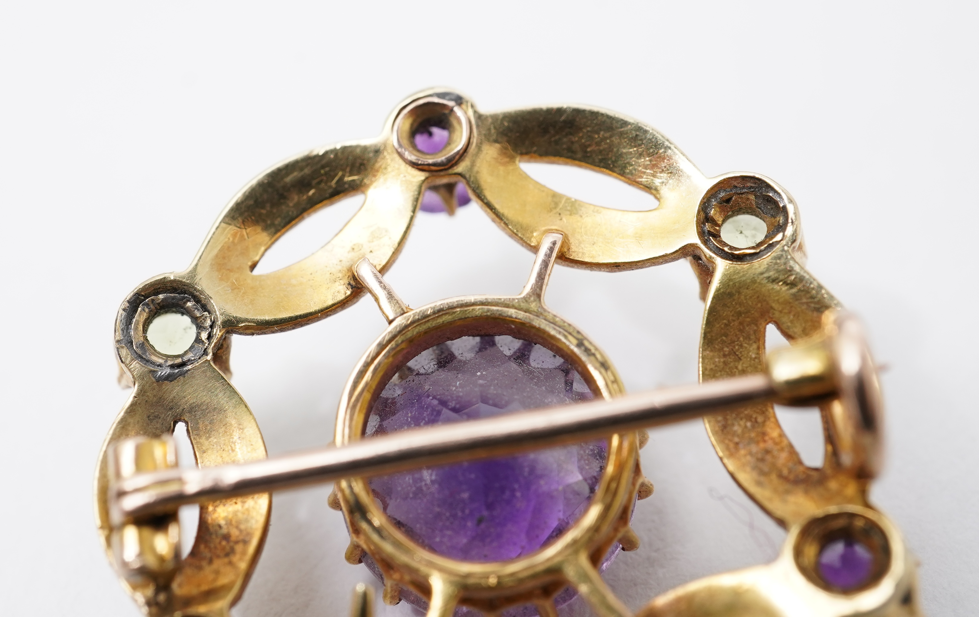 An Edwardian amethyst, chrysoberyl and seed pearl pendant/brooch, early 20th century